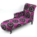 Chaise longue with contemporary pink, black and silver flower head design upholstery on turned