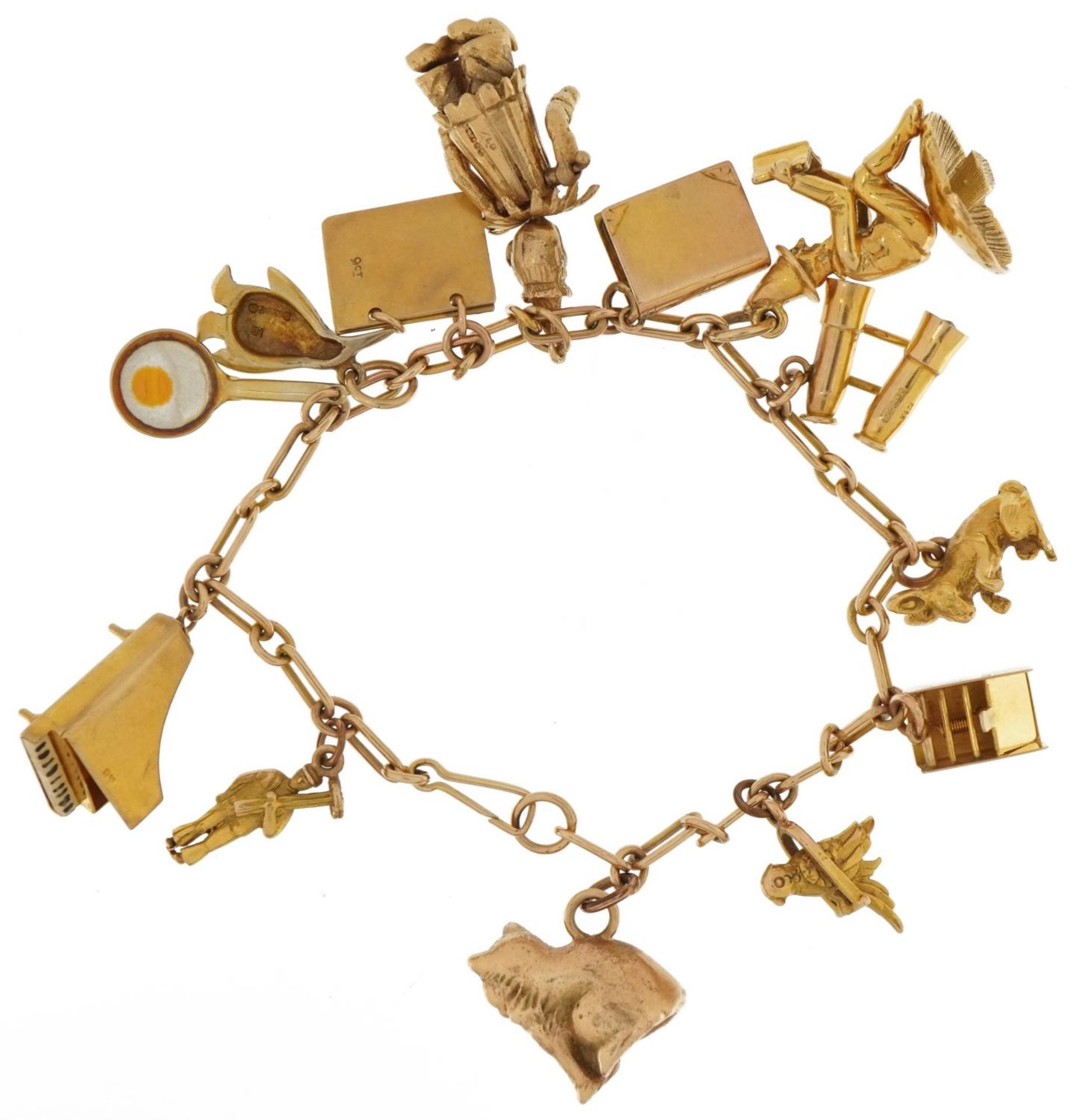 9ct gold charm bracelet with a selection of mostly gold charms including articulated clown, pixie on - Image 2 of 3