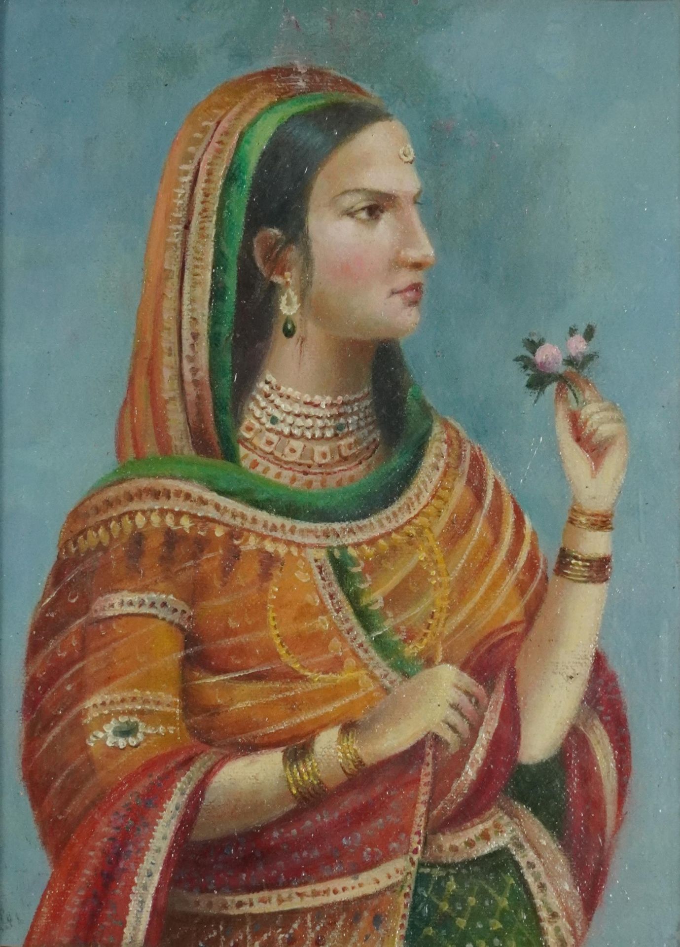 Top half portrait of an Indian female in traditional dress, oil, housed in a gesso frame, glazed,