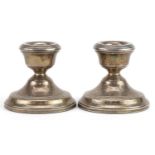 W I Broadway & Co, pair of Elizabeth II circular silver dwarf candlesticks, Birmingham 1970, 7cm