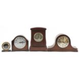 Four mantle clocks including oak cased Napoleon hat shaped Westminster chiming example, the