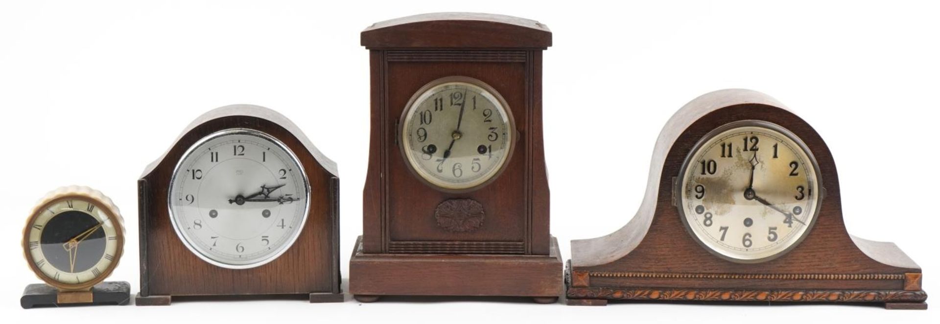 Four mantle clocks including oak cased Napoleon hat shaped Westminster chiming example, the
