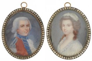 Pair of Georgian oval hand painted portrait miniatures onto ivory of a male in naval dress and a