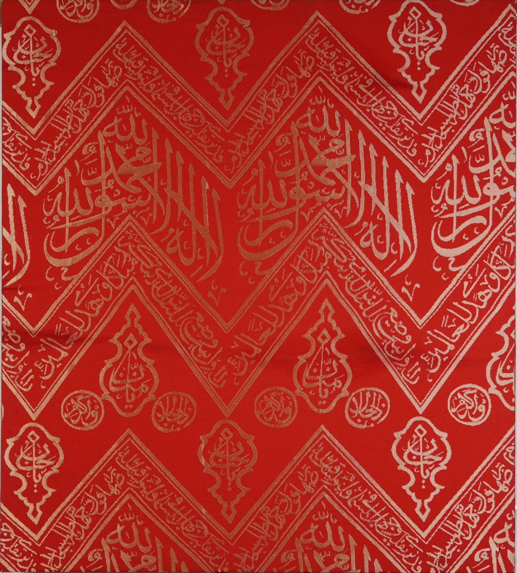 Islamic textile with calligraphy on stretcher, 106cm x 95cm : For further information on this lot