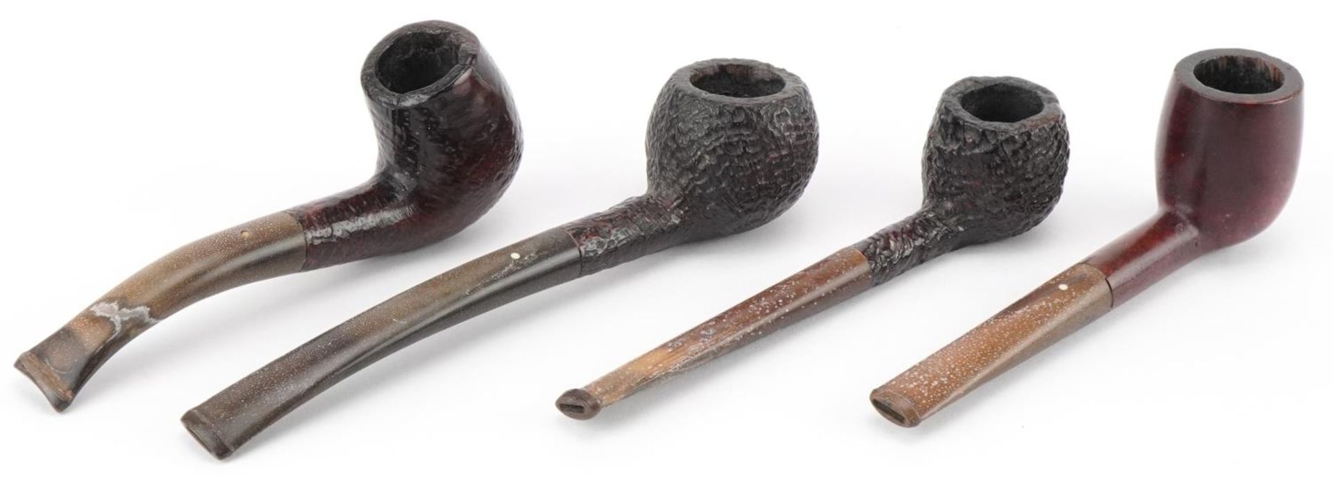 Four Dunhill briar tobacco smoking pipes arranged in a gate design pipe rack including Shell - Image 3 of 5