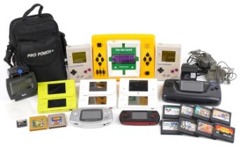 Vintage and later hand held games consoles including two original Nintendo Gameboys, Sega Game