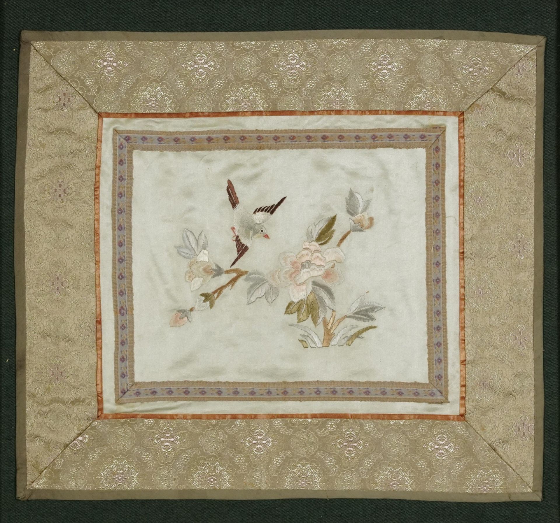 Chinese silk panel embroidered with a bird amongst flowers, mounted and framed, 30cm x 26.5cm