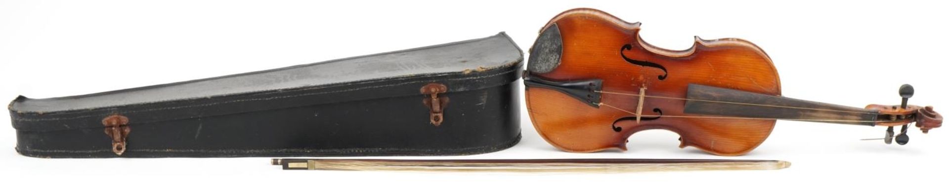 Old wooden violin with violin bow and case, the violin bearing an Antonio Stradivarius label, the - Image 4 of 5