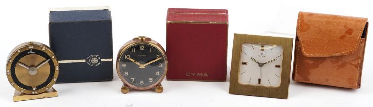 Three vintage Sima travel alarm clocks, two boxed, one with case, the largest 7.5cm high : For