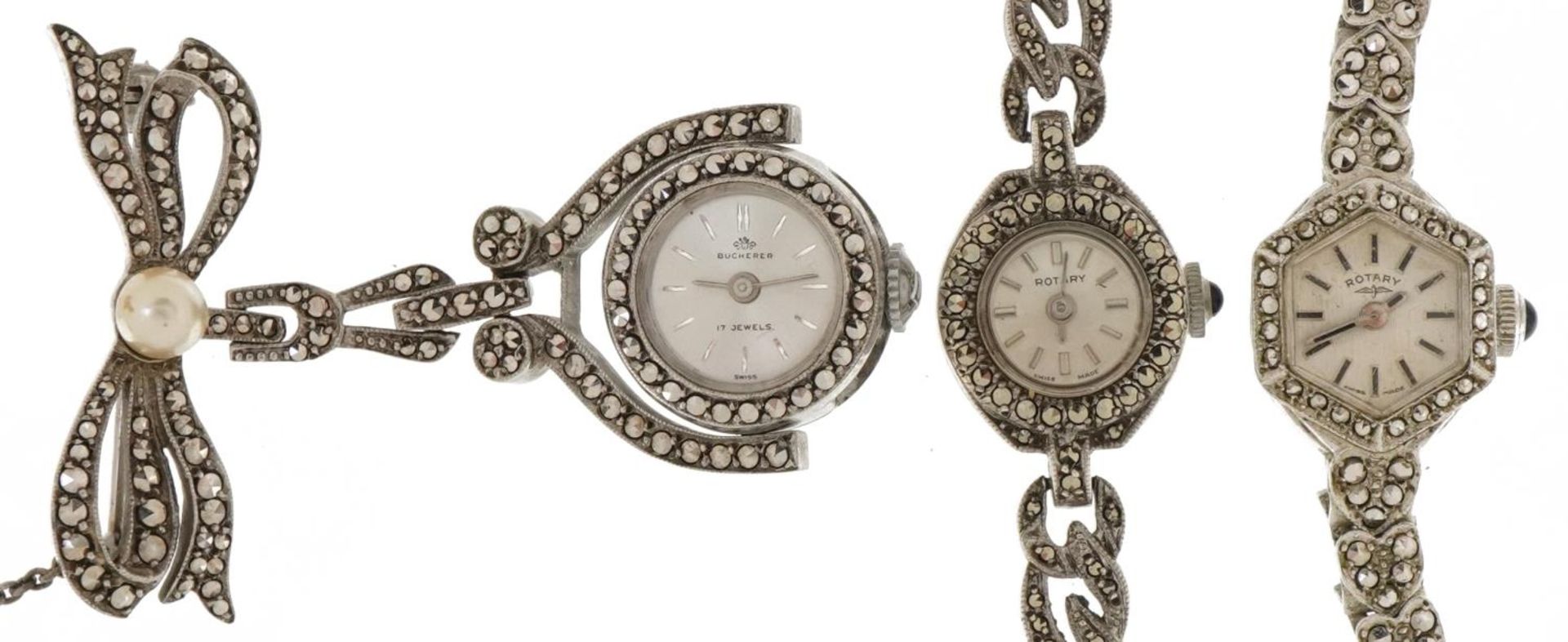 Three ladies silver marcasite watches comprising two Rotary wristwatches and a Bucherer fob watch,