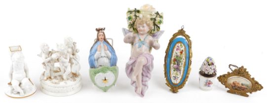 19th century and later porcelain including a spill vase in the form of Putti with bow and arrow,