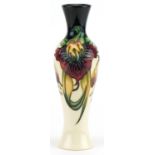 Moorcroft pottery baluster vase hand painted in the Anna Lilly pattern, 21cm high : For further