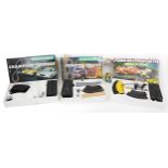 Three Scalextric racing sets with boxes comprising Champion Tourers, Monster Truck and Ford RS