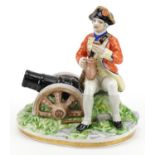 Naples porcelain figure of a Napoleonic soldier sitting beside a cannon, 17.5cm wide : For further