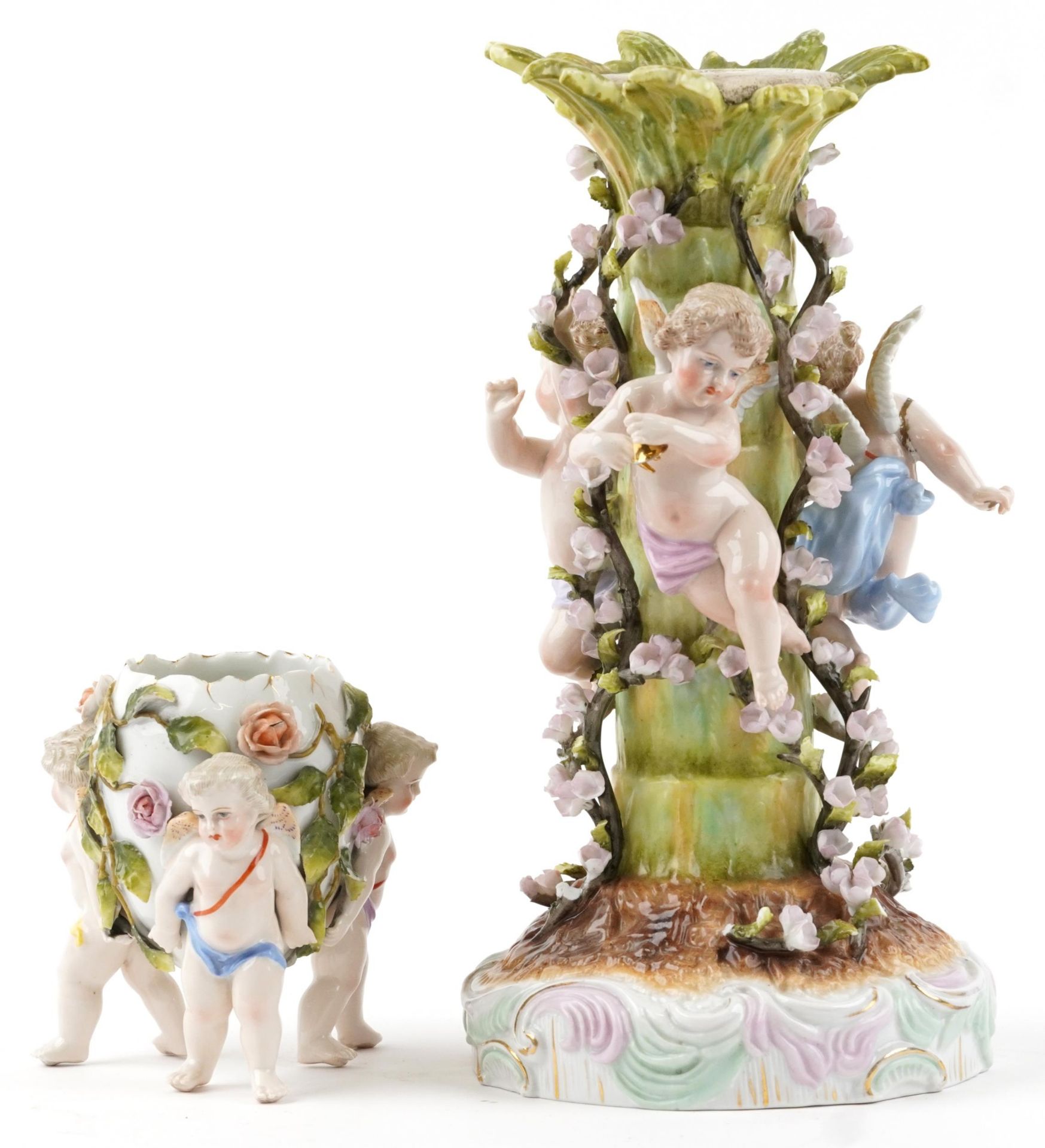 Plaue, German floral encrusted porcelain centrepiece surmounted with three Putti and a similar