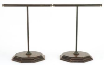 Pair of mahogany and bronzed display stands on octagonal bases, each 35.5cm high : For further