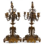 Large pair of 19th century French ormolu seven branch candelabras with urn supports and acanthus