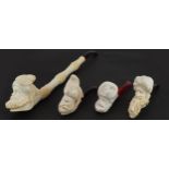 Four block Meerschaum tobacco smoking pipes, three with fitted cases, each with cherry amber