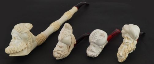 Four block Meerschaum tobacco smoking pipes, three with fitted cases, each with cherry amber