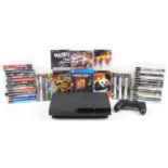 Sony PlayStation 3 games console with controller and a collection of games : For further information