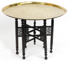 Islamic brass tray top tea table profusely engraved with panels of calligraphy on Moorish style