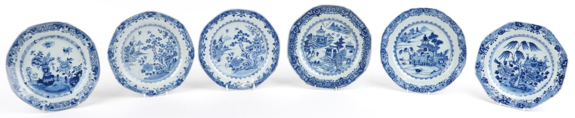 Six Chinese blue and white porcelain plates hand painted with river landscapes and flowers, each