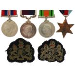 British military World War II RAF four medal group with two cloth badges including Long Service &