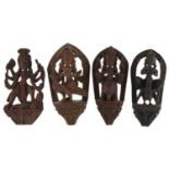 Four Burmese wood carvings of deities, the largest 11cm high : For further information on this lot