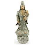 Large Chinese porcelain figure of Guanyin holding a baby with ruyi sceptre, having a celadon