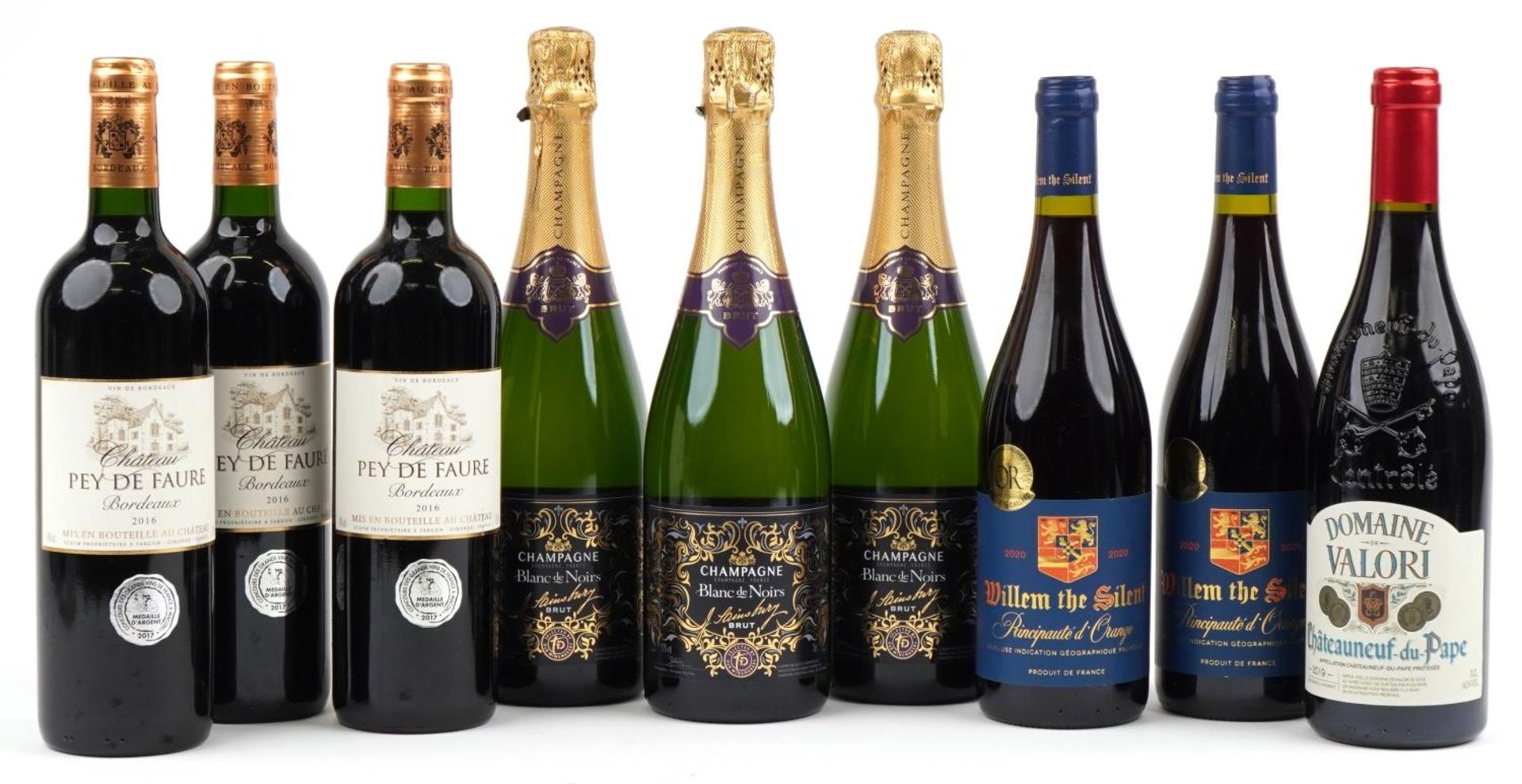 Six bottles of red wine and three bottles of Blanc de Noirs Champagne, the red wine comprising three