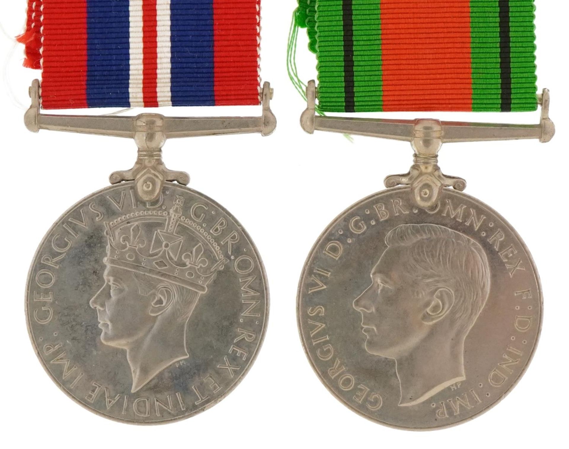 Two British military World War II medals with box of issue inscribed R C H Ainsworth : For further - Image 2 of 4