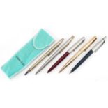 Tiffany & Co sterling silver ballpoint pens and four Parker examples, one with 12ct rolled gold case