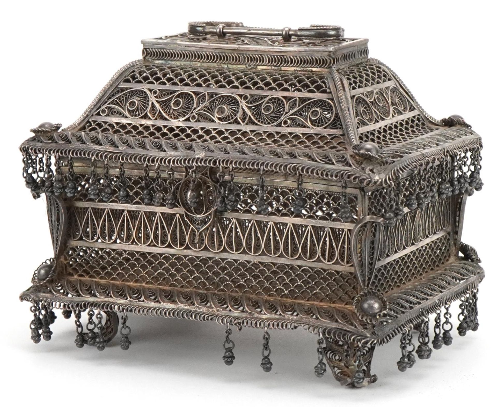 Indian Goa silver filigree table casket with tassel drops, the plaque impressed M L Bros CTC to
