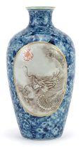 Chinese blue and white porcelain vase with two en grisaille panels hand painted with dragons, six