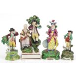 Four early 19th century pearlware figures including a Walton example and two entitled Sheperd and