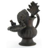 Antique Nepalese bronze oil lamp, 18cm high : For further information on this lot please visit www.