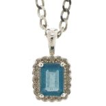 9ct white gold blue topaz and diamond pendant on a 9ct white gold necklace, 1.6cm high and 44cm in