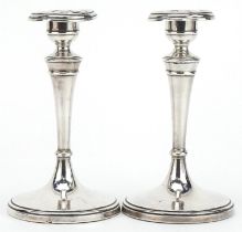 Charles Boyton & Sons Ltd, pair of Edwardian silver tapering candlesticks, Birmingham 1908, 15cm