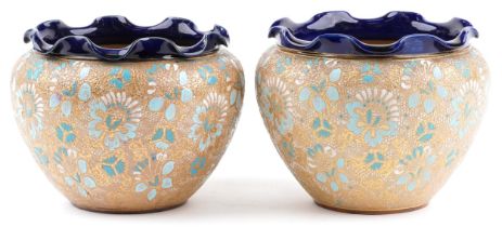 Royal Doulton, pair of Doulton Slater's patent stoneware jardinieres with frilled rims hand