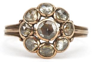 Antique unmarked gold diamond flower head ring, the central diamond approximately 4.20mm in