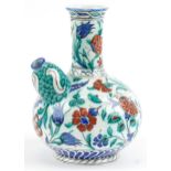 Turkish Iznik pottery kendi hand painted with stylised flowers, 27.5cm high : For further