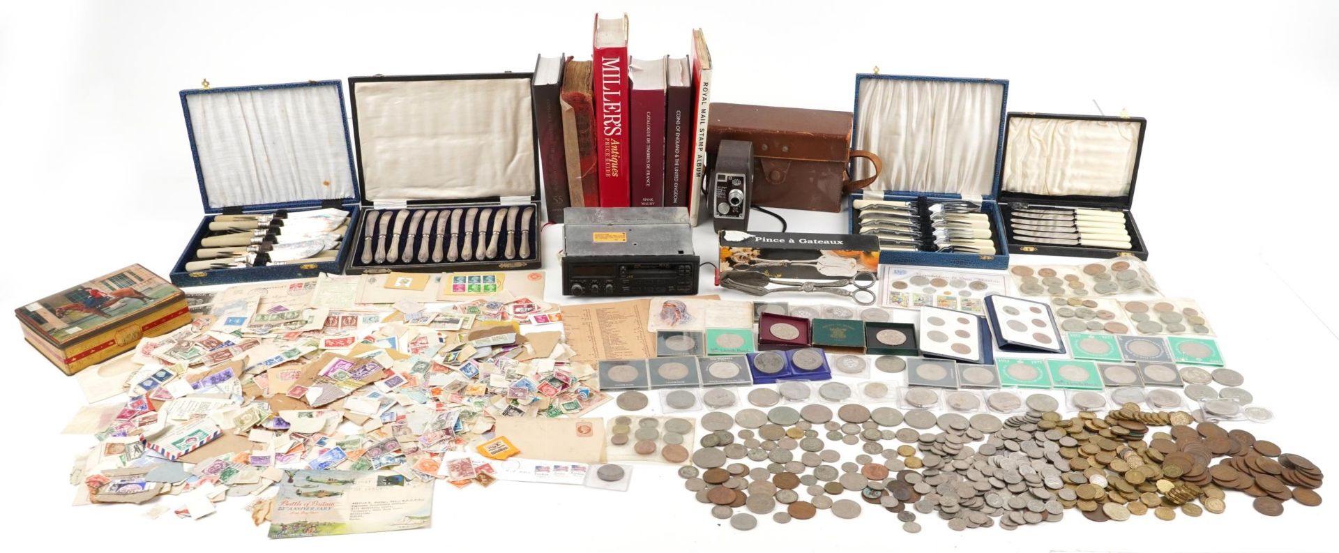 Coins, stamps and sundry items including five pound coins, Spink's coin reference books and silver