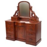Ornate Victorian mahogany dressing chest with swing mirror fitted with an arrangement of ten drawers