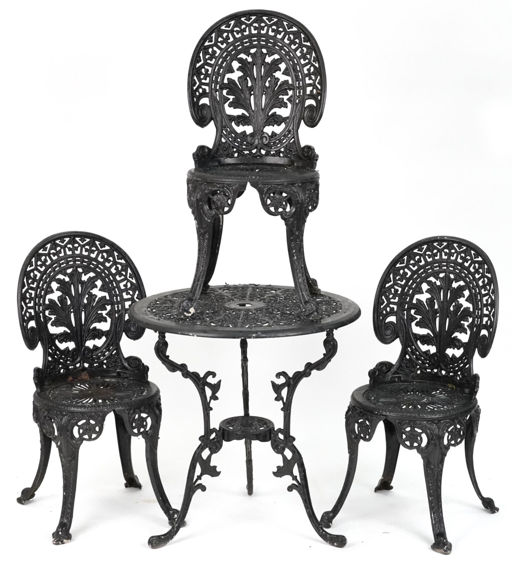 Black painted cast metal circular garden table with three chairs, 70.5cm high x 69cm in diameter :