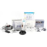 Vintage and later games consoles and accessories with boxes including Sony PlayStation 1, Sony
