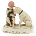 Royal Dux, Czechoslovakian Art Nouveau figure group of a young child with dog, numbered 3179 to