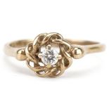 9ct gold diamond solitaire ring with openwork setting, the diamond approximately 2.30mm in diameter,