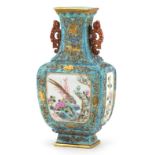 Chinese porcelain blue ground vase with iron red animalia handles finely hand painted in the famille