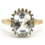 9ct gold aquamarine and diamond ring, the aquamarine approximately 10.15mm x 8.05mm x 5.20mm deep,