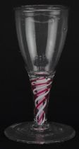 18th century cordial glass with multiple red and white opaque twist stem, 11.5cm high : For